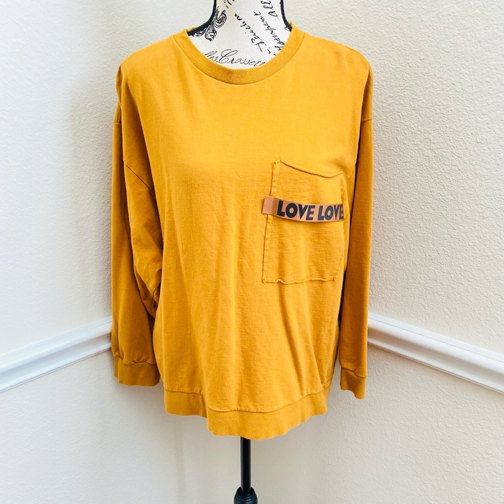 Have long sleeve mustard shirt S